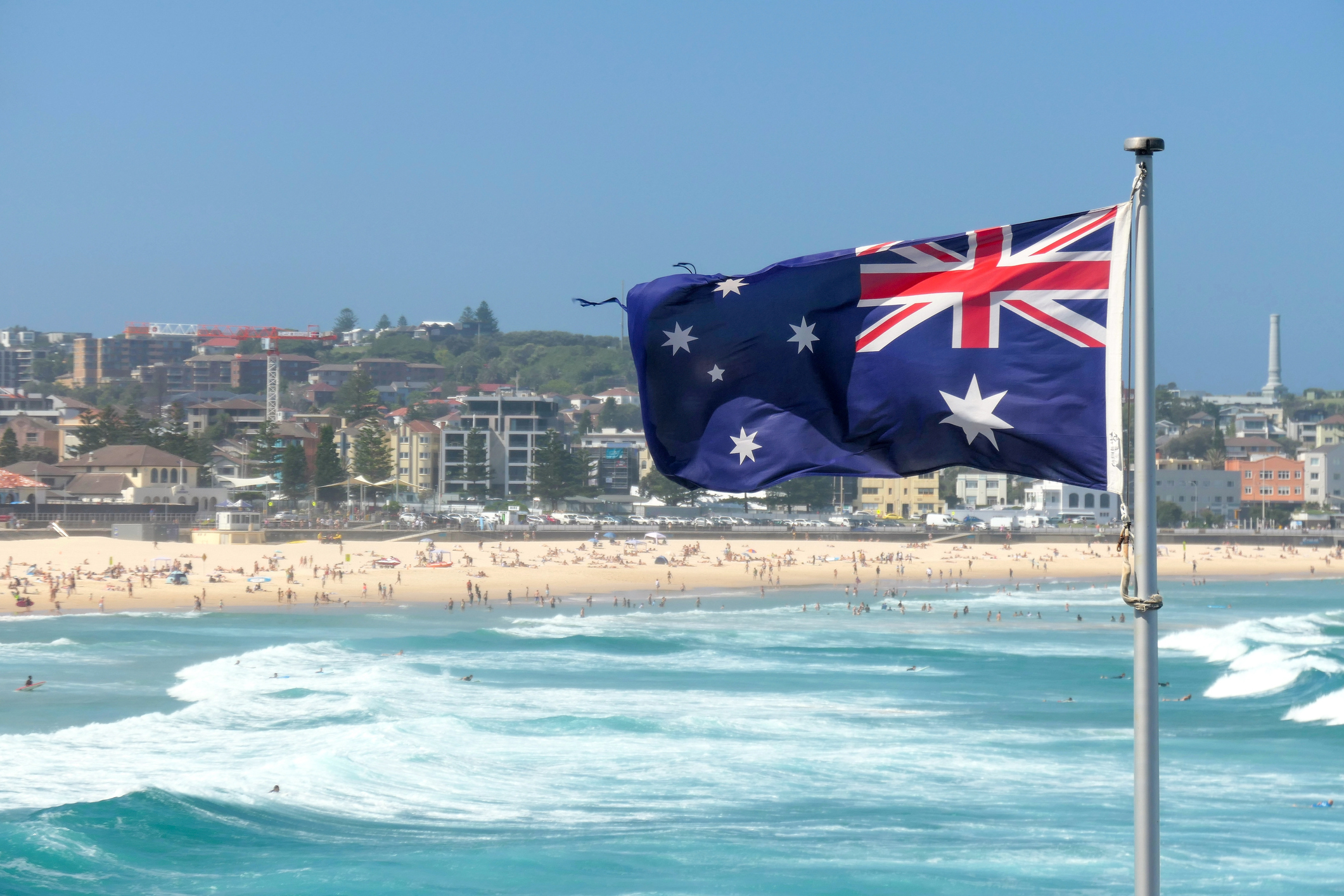 Flag of Australia over beach