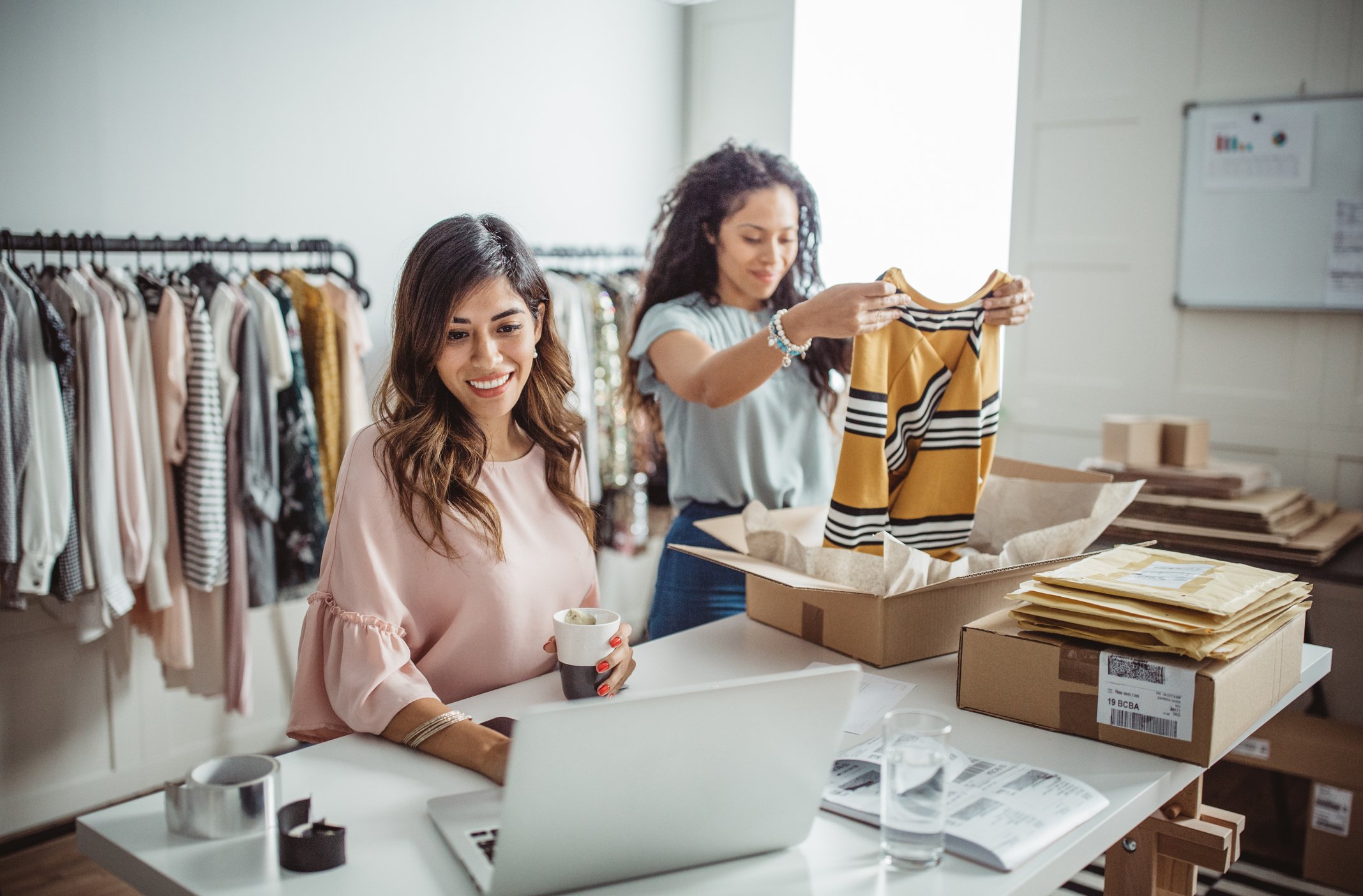 Two women selling clothes