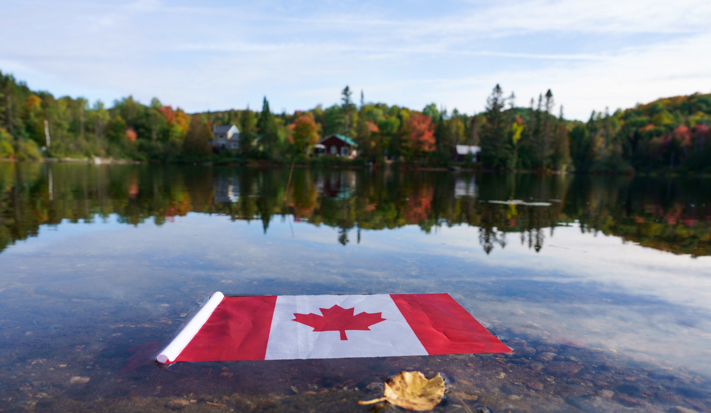 Canadian flag in lake