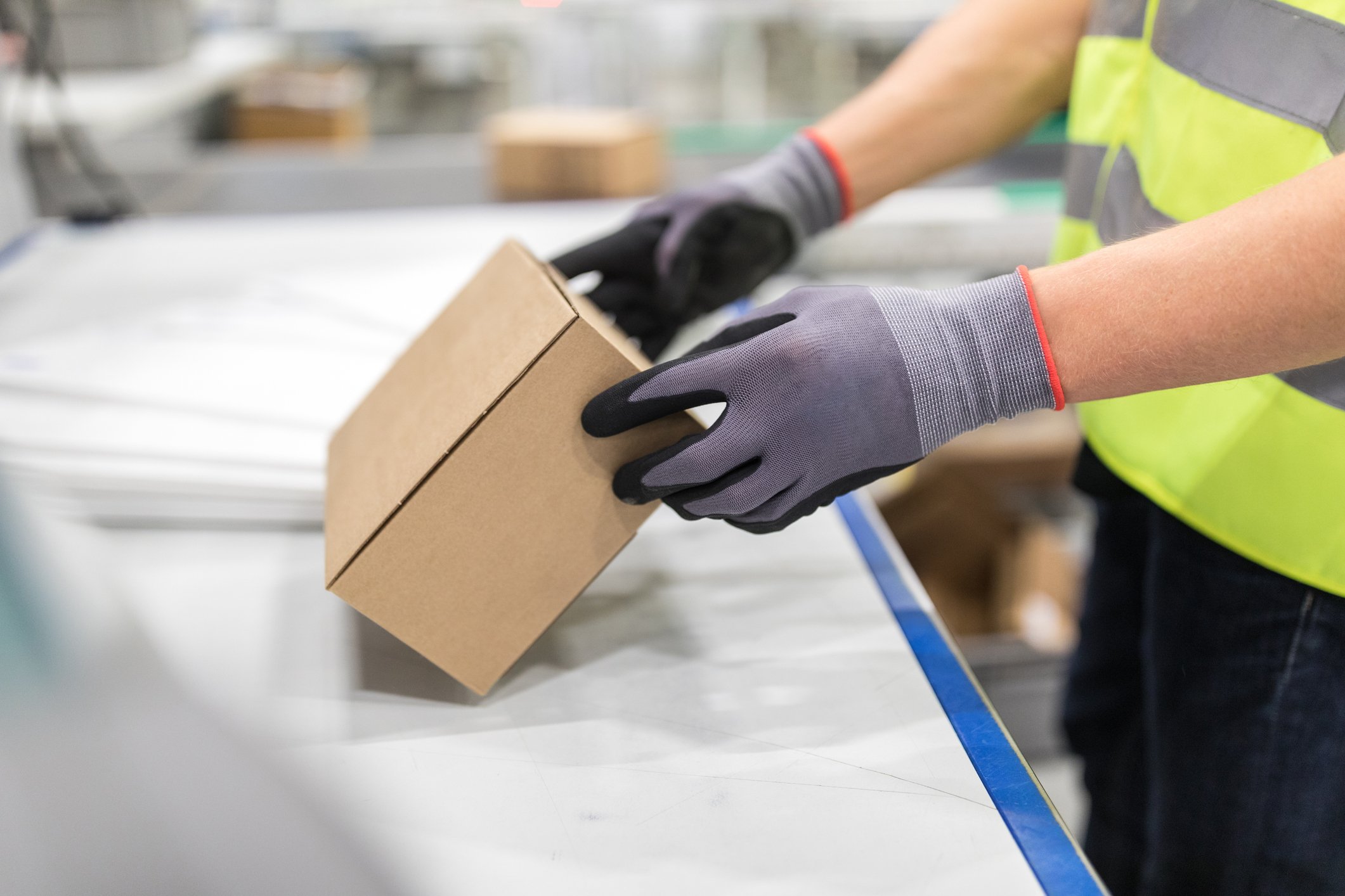 close up of person inspecting parcel