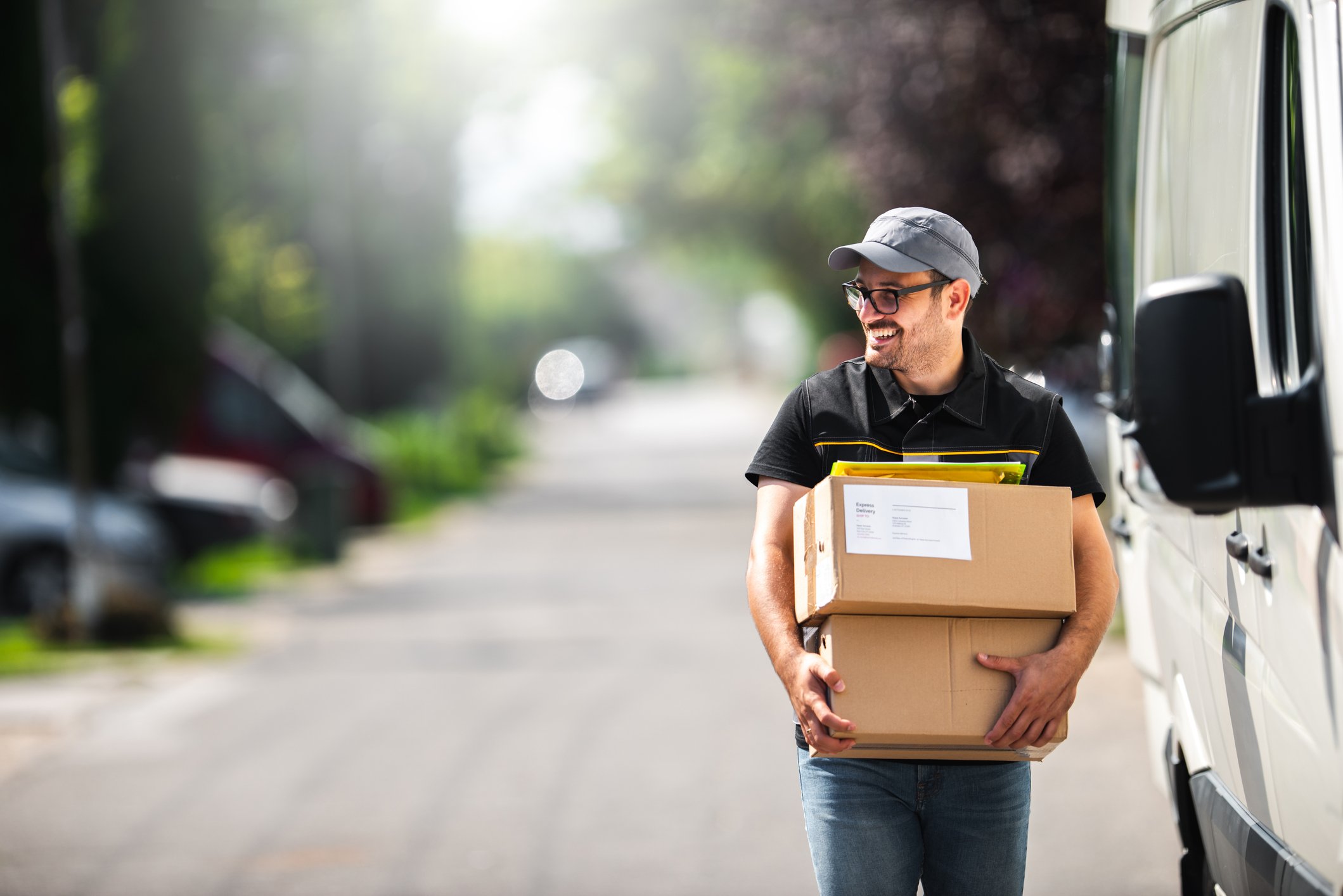 delivery-man-holding-parcels