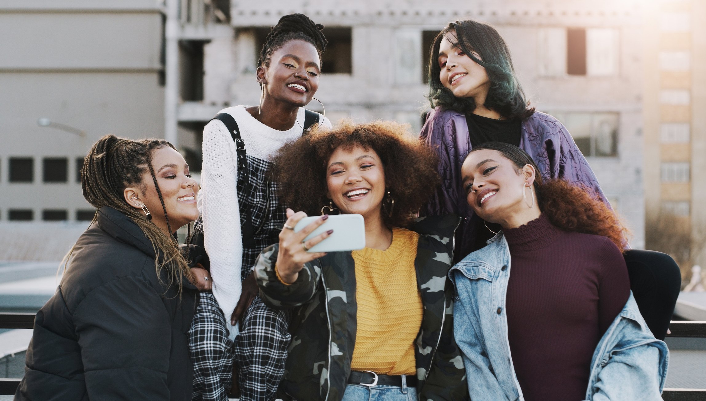 Group of young women on phone