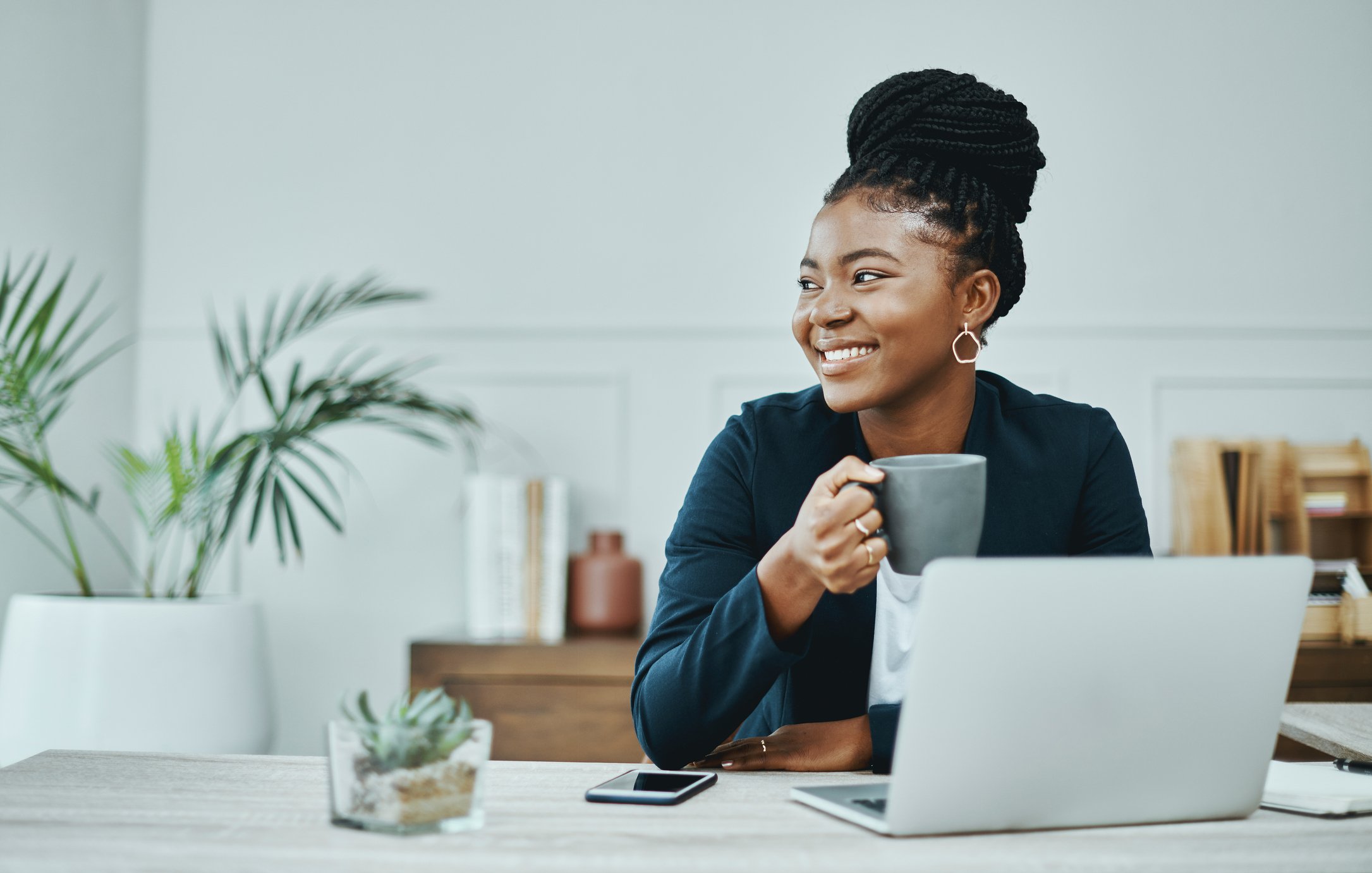 person happy using laptop