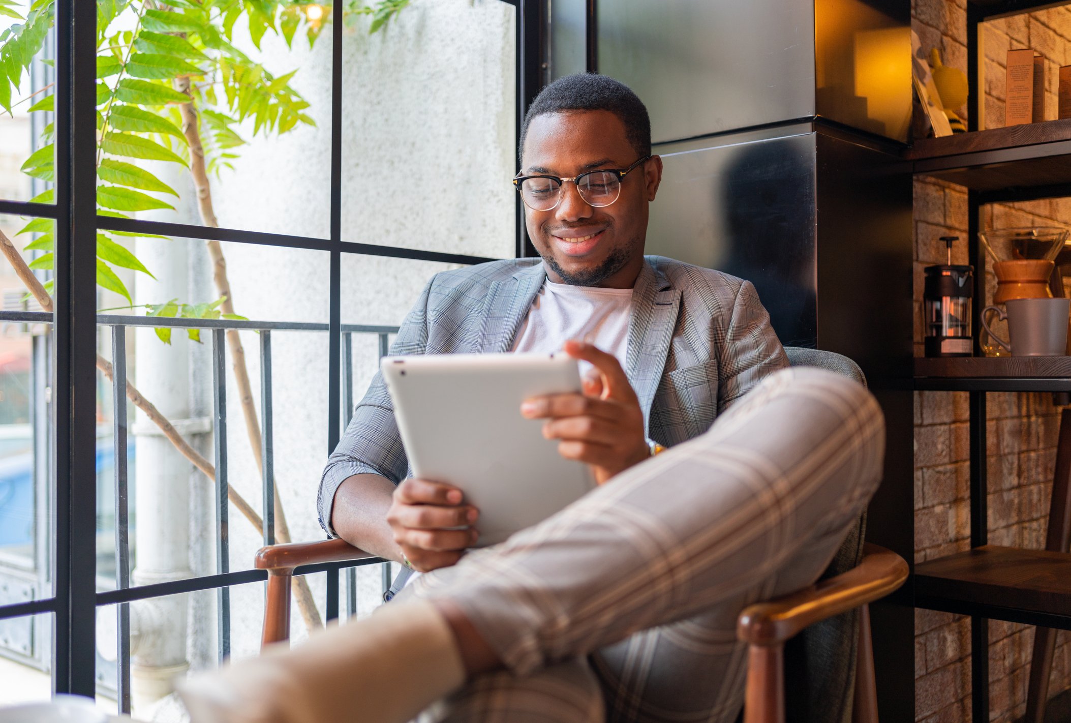 Man reading iPad