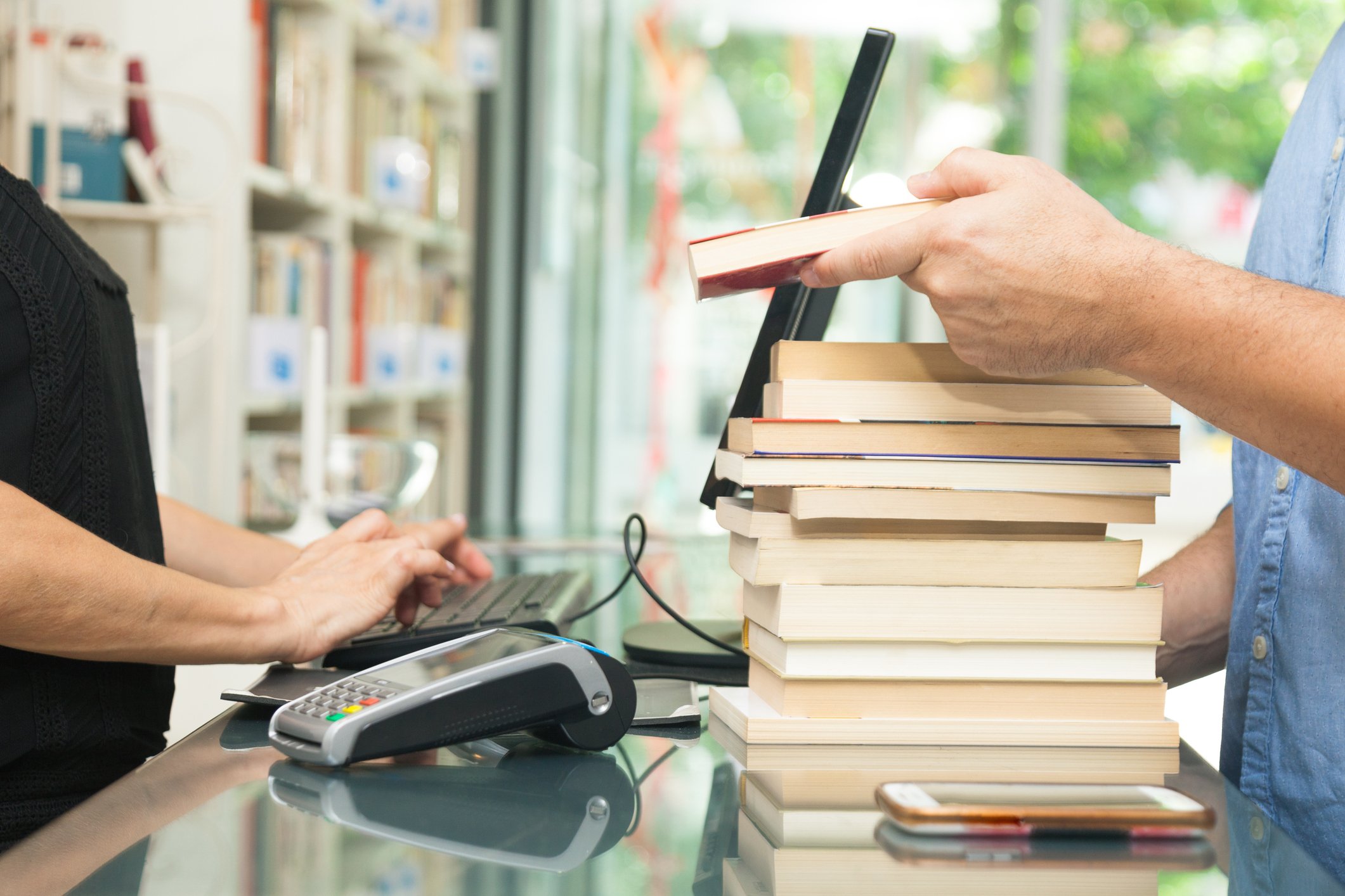 Man buying books