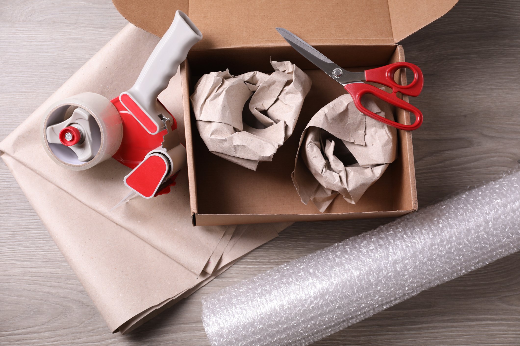 parcel with various craft items inside