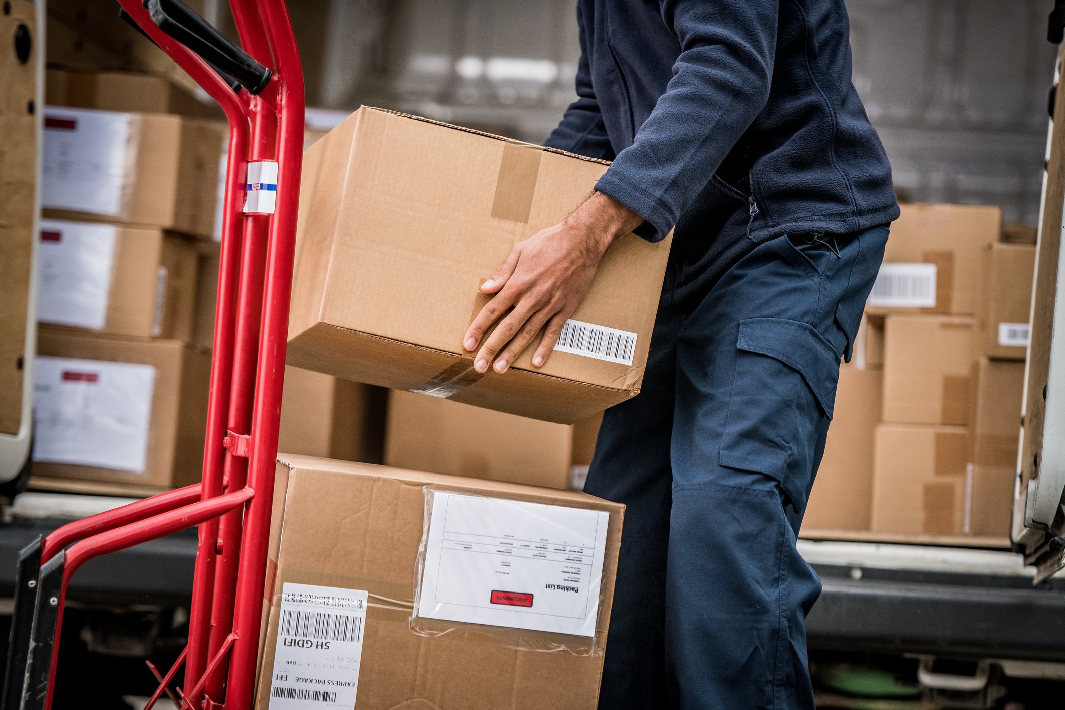 person carrying parcels