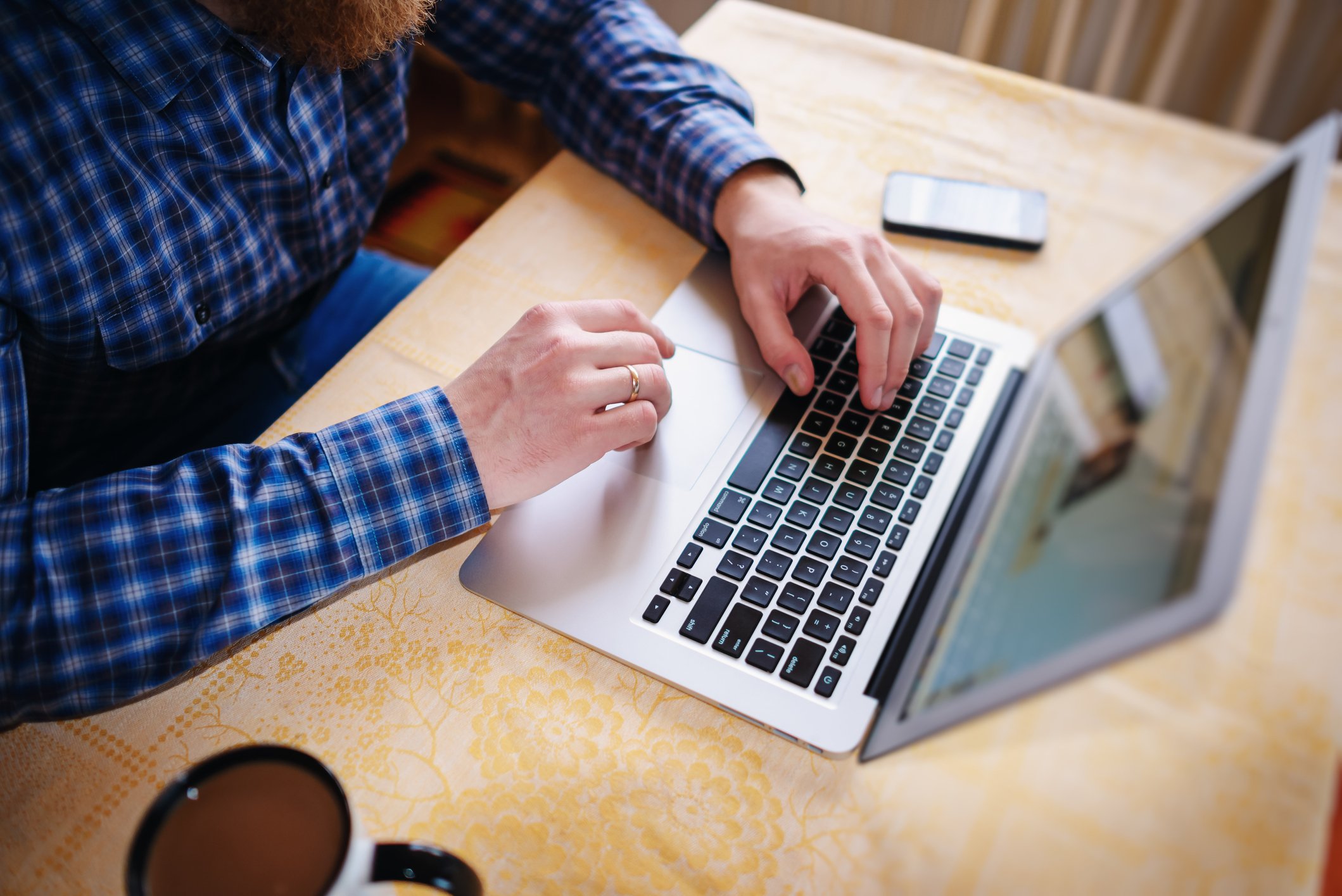 close up of person using laptop