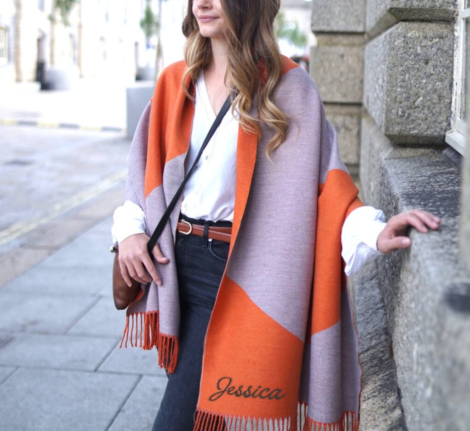 Lady in orange and lilac scarf