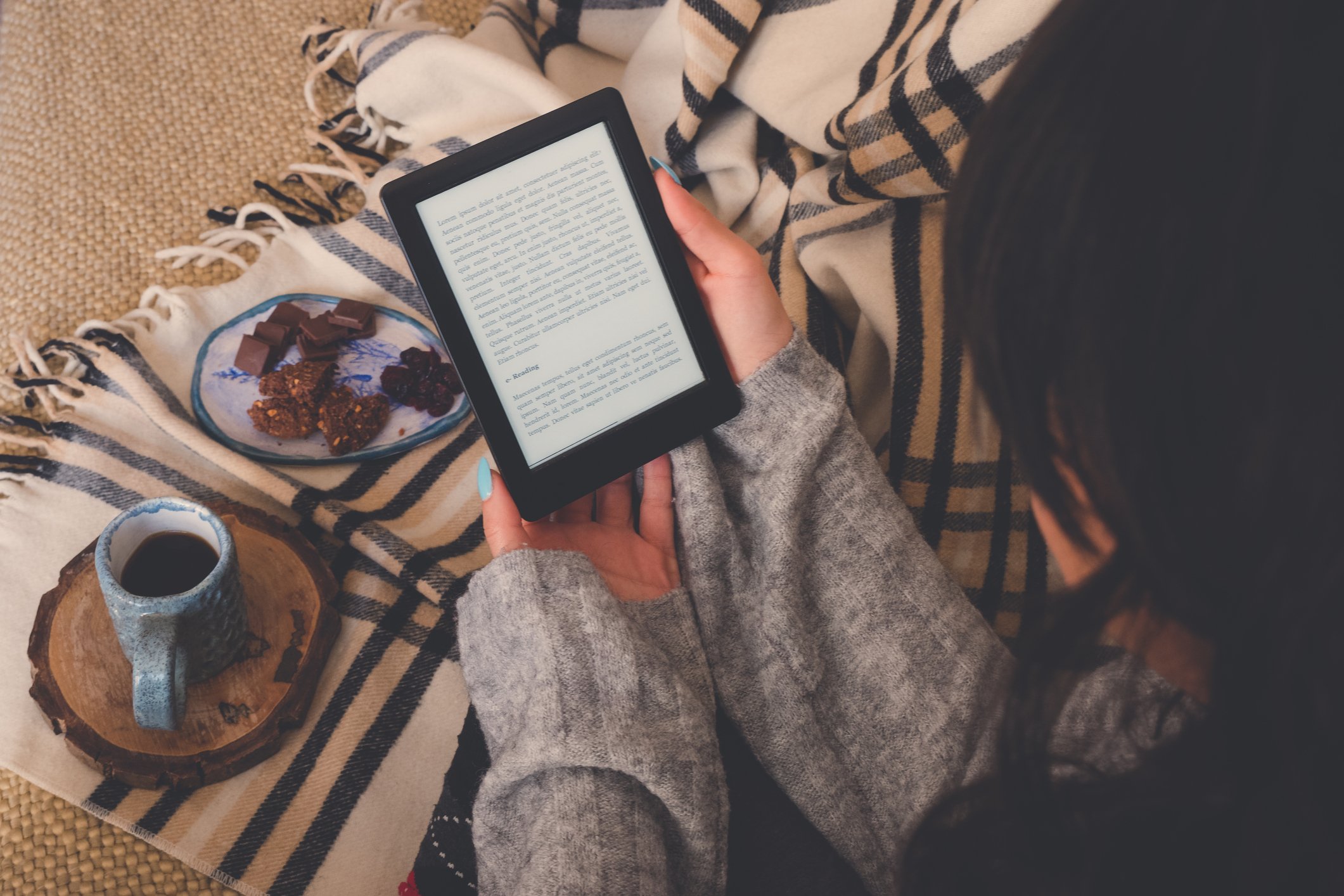 Woman reading kindle