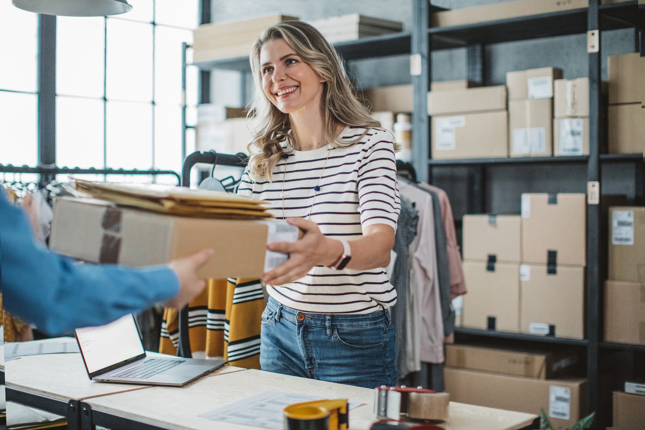 woman-receiving-parcel-at-storage-place